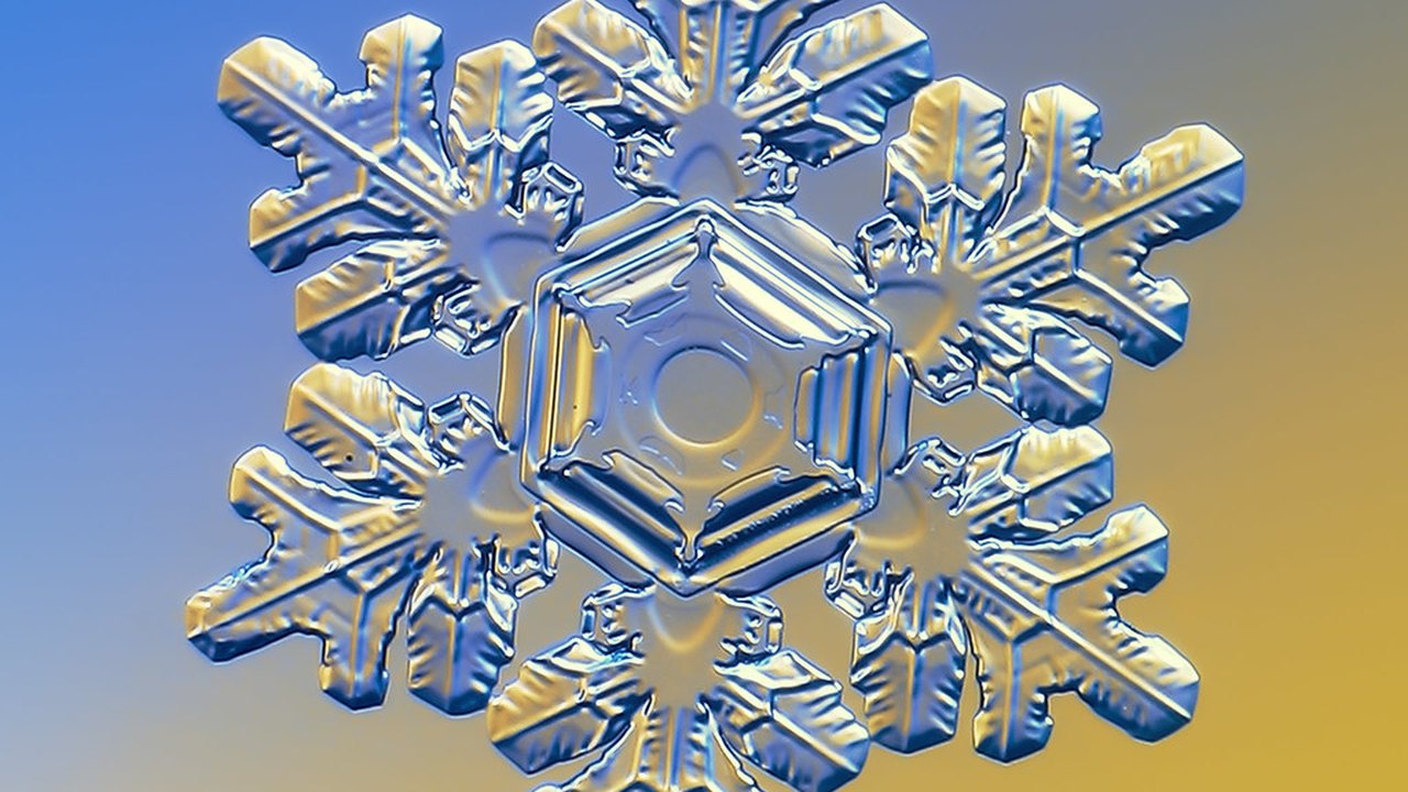 A single symmetrical ice crystal in macro — the uniform ice that controlled nucleation aims to sculpt in resonance lyophilisation; a Panacea Bio Chem and Bogdan Dicoias brief
